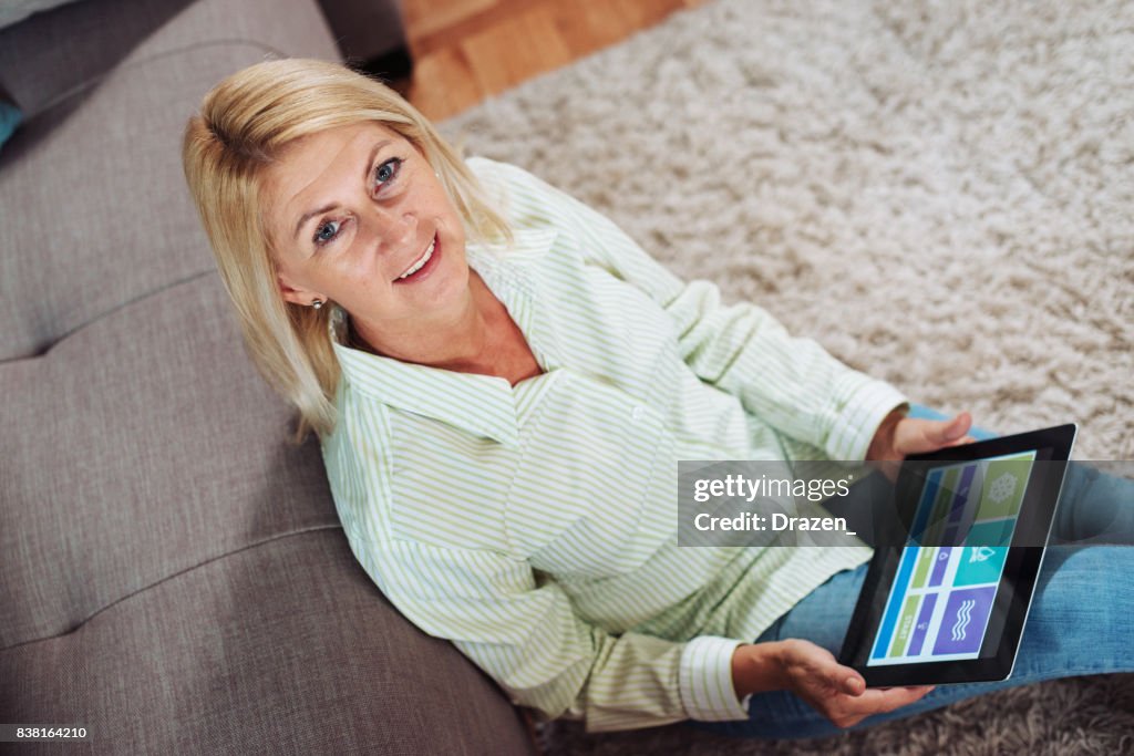 Woman using smart home app