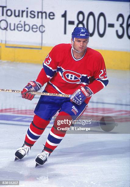 Canadian ice hockey player Brian Bellows of the Montreal Canadiens skates on the ice during a game, early 1990s.