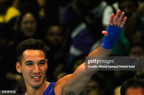 Gold medalist Marvin John Nobel Tupas of Philippines celebrated after winning the men's boxing ligh heavy against Adli Hafidz Mohd Pauzi of Malaysia...