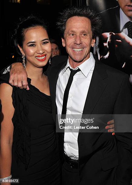 Chau-Giang Thi Nguyen and Producer Brian Grazer aarrive at the Los Angeles premiere of "Frost/Nixon" held at the Academy of Motion Picture Arts and...