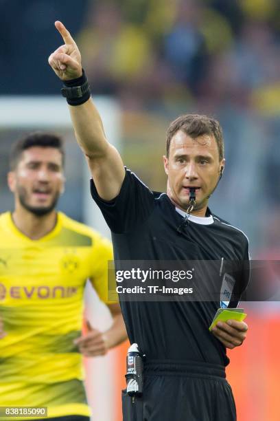 Schiedsrichter Felix Zwayer gestures during the DFL Supercup 2017 match between Borussia Dortmund and Bayern Muenchen at Signal Iduna Park on August...