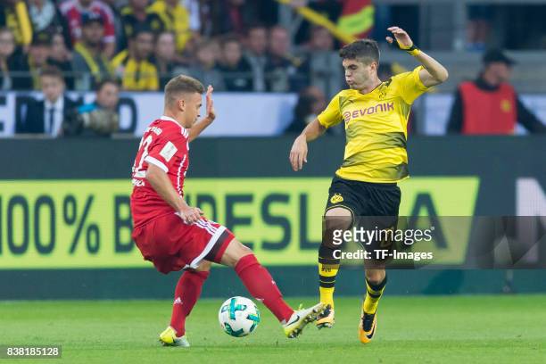 Joshua Kimmich of Bayern Muenchen and Christian Pulisic of Dortmund battle for the ball during the DFL Supercup 2017 match between Borussia Dortmund...