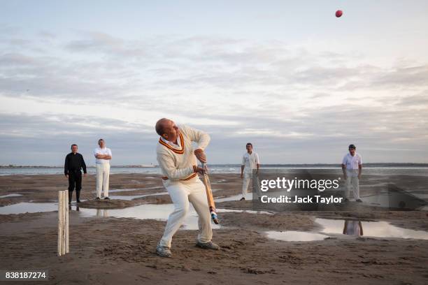 Teams play a cricket match on the Brambles sandbank at low tide on August 24, 2017 in Hamble, England. The annual event sees Hamble's Royal Southern...