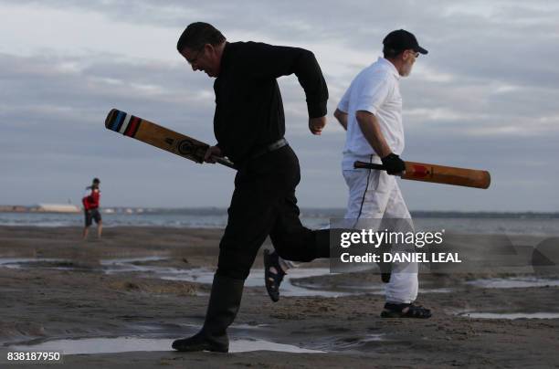 Cricket players from the Royal Southern Yacht Club and Cowes Island Sailing Club play an annual cricket match in the middle of The Solent, on the...