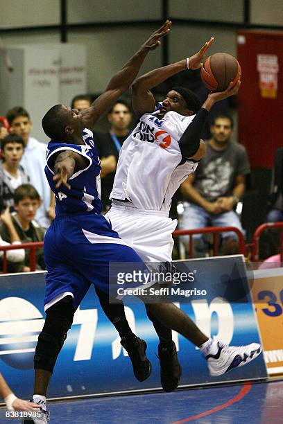 Shawn James, #15 of Bnei Hasharon competes with Michael Wright, #7 of Turk Telekom during the Eurocup Basketball Game 1 match between Bnei Eshet...