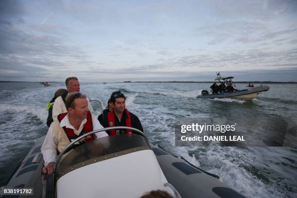 Players from the Royal Southern Yacht Club and Cowes Island Sailing Club travel by boat to play an annual cricket match on the Brambles sandbank in...