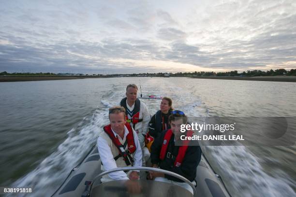 Players from the Royal Southern Yacht Club and Cowes Island Sailing Club travel by boat to play an annual cricket match on the Brambles sandbank in...