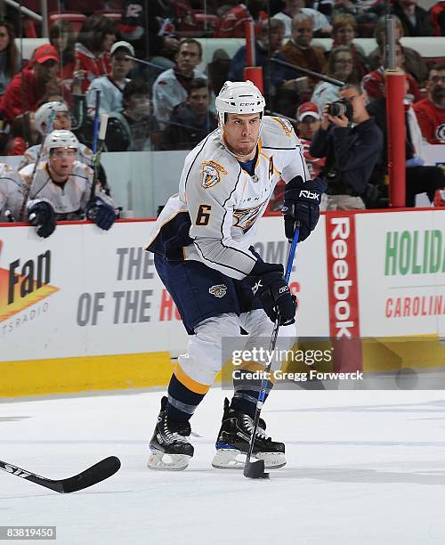 Shea Weber of the Nashville Predators skates with the puck during a NHL game against the Carolina Hurricanes on November 23, 2008 at RBC Center in...