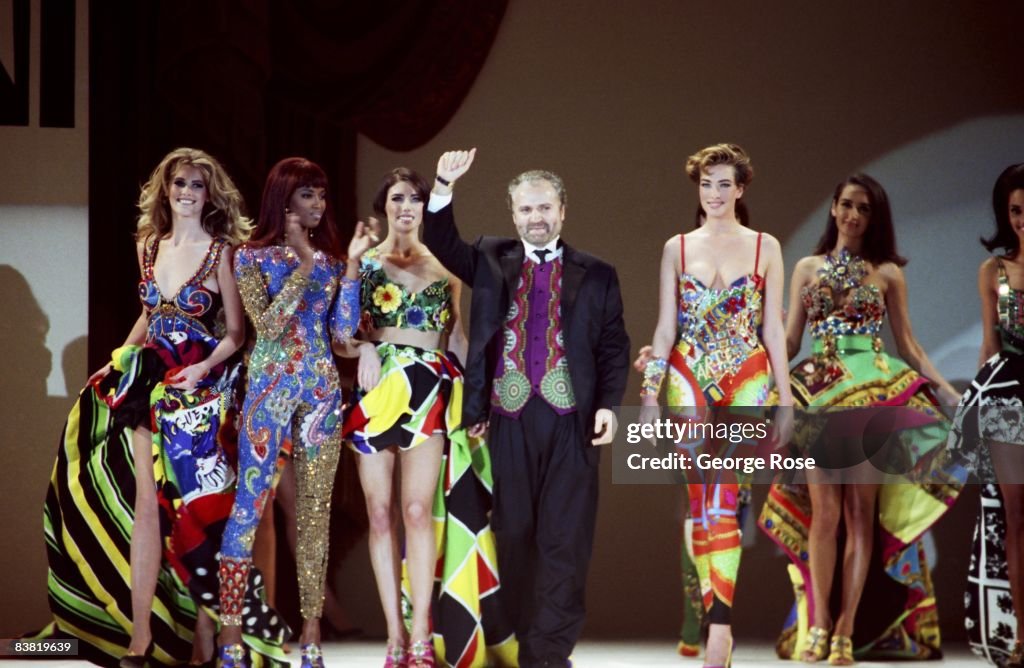 Stars Attend Gianni Versace Fashion Show