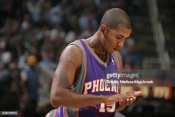 Raja Bell of the Phoenix Suns rests on the court during the game against the Utah Jazz on November 17, 2008 at EnergySolutions Arena in Salt Lake...