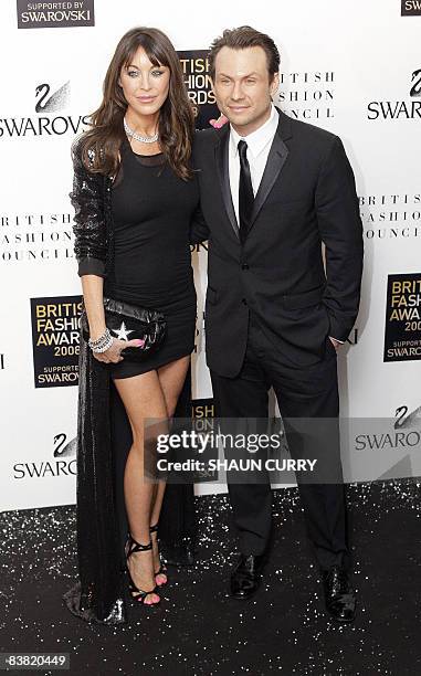 President and Founder of a line of designer shoes, Jimmy Choo, Tamara Melon and US actor Christian Slater arrives for the 2008 British Fashion Awards...