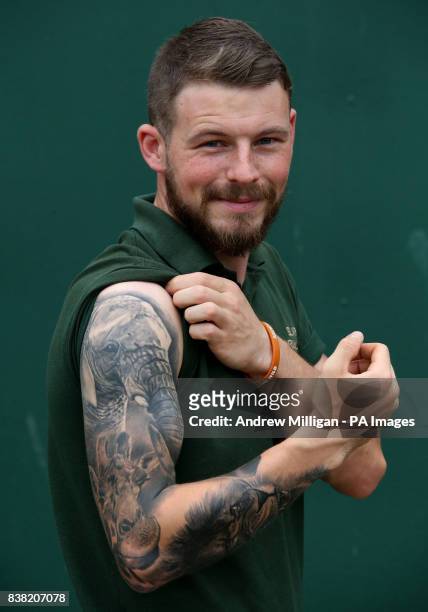 Blair Drummond Safari Park keeper Graeme Alexander, shows his tattoos of giraffe Ruby and elephant Mondy, which he has along with tattoos of zebra...