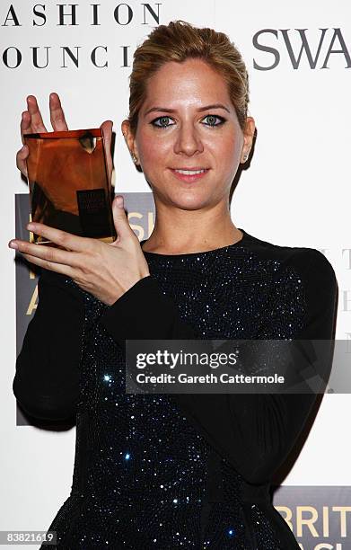 Louise Goldin poses with the Swarovski Emerging Talent award during the British Fashion Awards 2008 held at The Lawrence Hall on November 25, 2008 in...