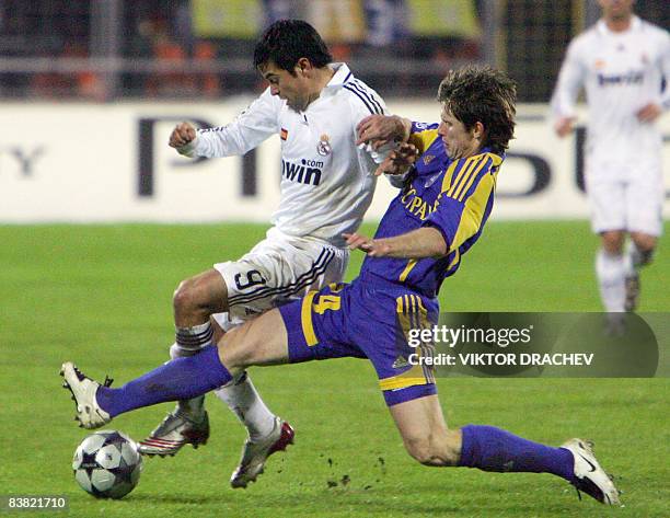 Real Madrid's Argentinian footballer Javier Saviola fights for the ball against Bate Borisov's Russian footballer Vitali Kazantsev during their...