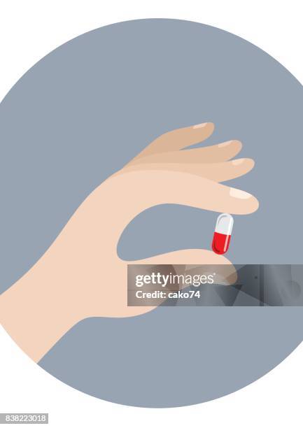 pill and hand - holding pill stock illustrations