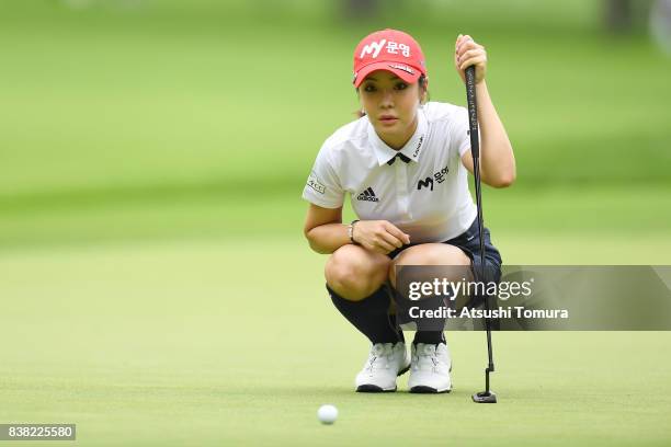 Shin-Ae Ahn of South Korea lines up her putt on the 3rd hole during the first round of the Nitori Ladies 2017 at the Otaru Country Club on August 24,...