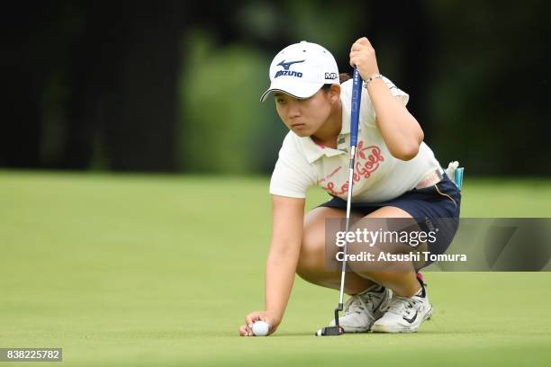 Hikaru Yoshimoto of Japan lines up her putt on the 14th green during the first round of the Nitori Ladies 2017 at the Otaru Country Club on August...