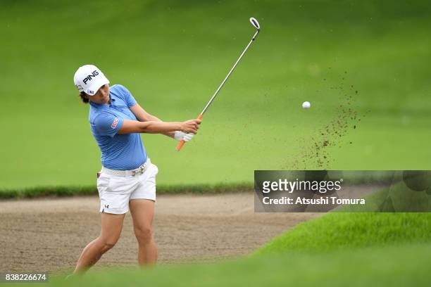 Yuki Ichinose of Japan hits from a bunker on the 14th hole during the first round of the Nitori Ladies 2017 at the Otaru Country Club on August 24,...