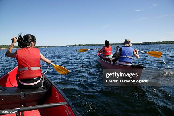 two canoes on a lake - killbear provincial park stockfoto's en -beelden