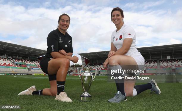 Sarah Hunter, captain of England and Fiao'o Faamausili captain of the New Zealand Black Ferns pose with the Women's Rugby World Cup prior to...