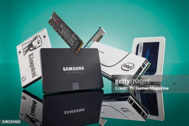 Group of solid-state drives, including Kingston, Intel, Samsung and Crucial brands, taken on November 16, 2016.