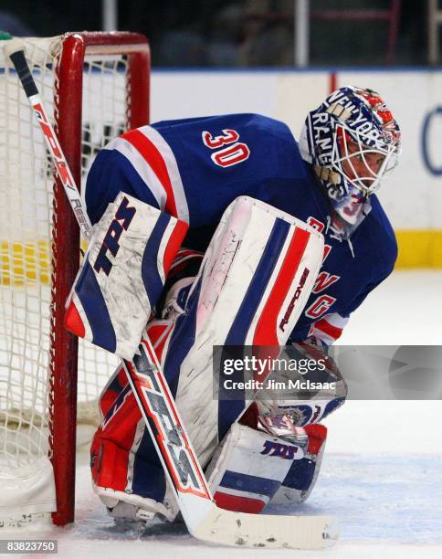 Henrik Lundqvist of the New York Rangers defends his net against the Phoenix Coyotes on November 24, 2008 at Madison Square Garden in New York City....