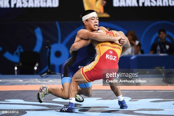 Zholchubekov K of kyrgyzstan and Fumita K of Japan during the Men's 59 Kg Greco-Roman competition during the Paris 2017 World Championships at...