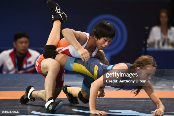 Sonhyang Kim and Fredrika Ida Petersson during the female wrestling 48 kg competition during the Paris 2017 Women's World Championships at...