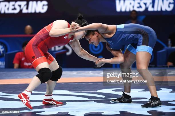 Koumba Larroque and Sara Dosho during the female wrestling 69kg competition during the Paris 2017 Women's World Championships at AccorHotels Arena on...