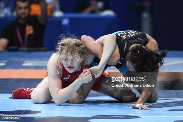 Tatiana Debien and Lannuan Luo during the female wrestling 53kg competition during the Paris 2017 Women's World Championships at AccorHotels Arena on...