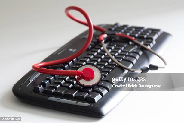 Symbol photo on the topics computer crime, economy crime, espionage, hacker, etc. The photo shows a computer keyboard and a stethoscope.