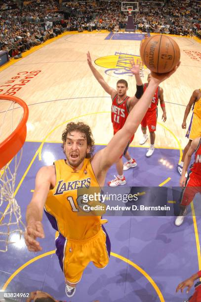 Pau Gasol of the Los Angeles Lakers goes up for a dunk during the game against the New Jersey Nets at Staples Center on November 25, 2008 in Los...