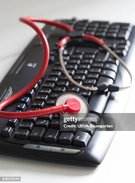 Symbol photo on the topics computer crime, economy crime, espionage, hacker, etc. The photo shows a computer keyboard and a stethoscope.