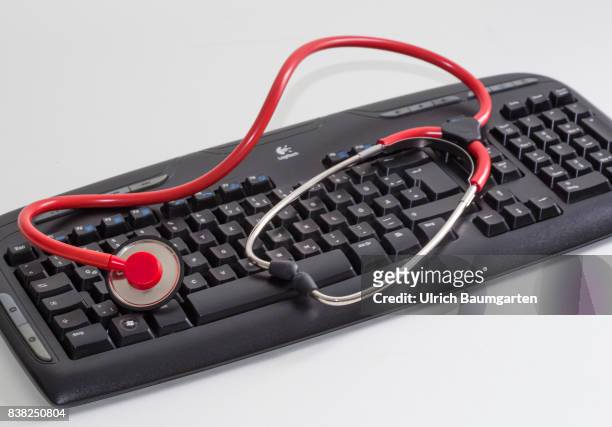 Symbol photo on the topics computer crime, economy crime, espionage, hacker, etc. The photo shows a computer keyboard and a stethoscope.