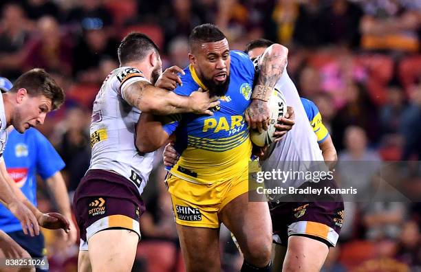 Frank Pritchard of the Eels takes on the defence during the round 25 NRL match between the Brisbane Broncos and the Parramatta Eels at Suncorp...