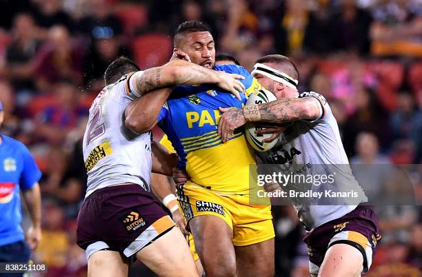 Frank Pritchard of the Eels takes on the defence during the round 25 NRL match between the Brisbane Broncos and the Parramatta Eels at Suncorp...