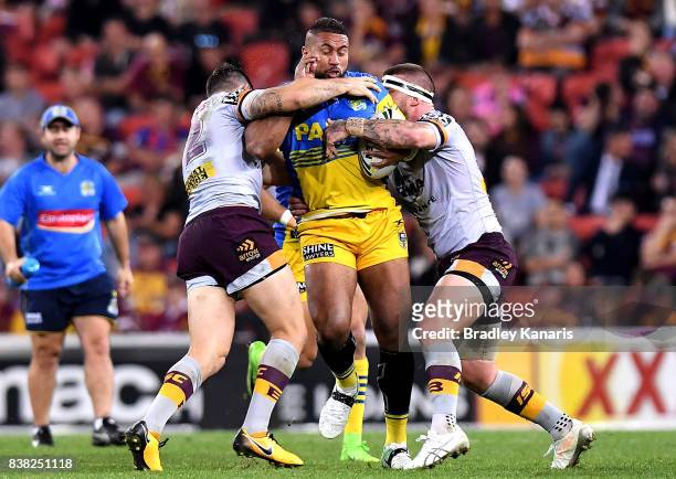 Frank Pritchard of the Eels takes on the defence during the round 25 NRL match between the Brisbane Broncos and the Parramatta Eels at Suncorp...