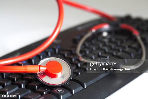 Symbol photo on the topics computer crime, economy crime, espionage, hacker, etc. The photo shows a computer keyboard and a stethoscope.