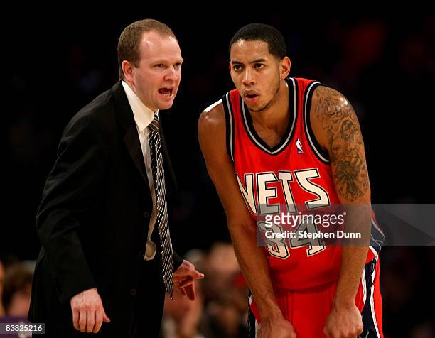 Head coach Lawrence Frank and Devin Harris of the New Jersey Nets confer during the game with the Los Angeles Lakers on November 25, 2008 at Staples...