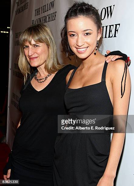 Director Catherine Hardwicke and actress Christian Serratos arrives at the premiere of "The Yellow Handkerchief" held at the WGA theater on November...