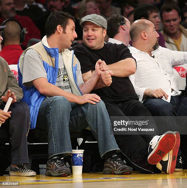 Adam Sandler and Kevin James attend the Los Angeles Lakers vs New Jersey Nets game at the Staples Center on November 25, 2008 in Los Angeles,...