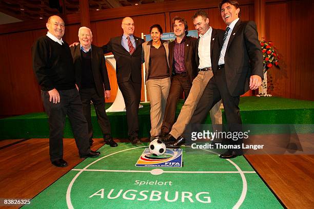 World champion player Uli Biesinger; Augsburg's famous player Helmut Haller, lord mayor of Augsburg, Dr. Kurt Gribl; Steffi Jones, president LOC of...