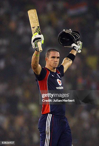 Kevin Pietersen of England celebrtes his century during the 5th One Day International between India and England played at The Barabati Stadium on...