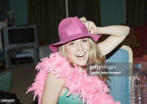 woman wearing feather boa and hat - boa bildbanksfoton och bilder