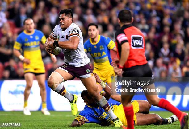 Herman Ese'ese of the Broncos breaks through the defence during the round 25 NRL match between the Brisbane Broncos and the Parramatta Eels at...
