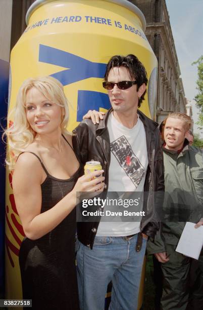 Actress Pamela Anderson with her husband Tommy Lee at the launch of Virgin Energy drink in London, 22nd May 1995.