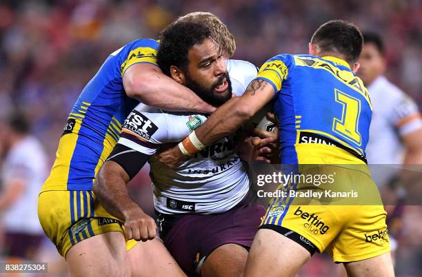 Sam Thaiday of the Broncos takes on the defence during the round 25 NRL match between the Brisbane Broncos and the Parramatta Eels at Suncorp Stadium...