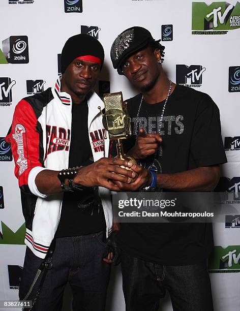 Peter Okoye and Paul Okoye of P-Square poses backstage with their award for Best Group at the MTV Africa Music Awards 2008 at the Abuja Velodrome on...