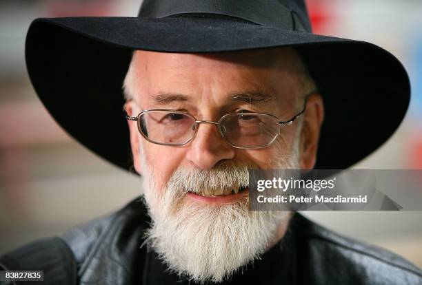 Author Terry Pratchett poses for photographs outside Number 10 Downing Street on November 26, 2008 in London. Mr Pratchett, who was recently...