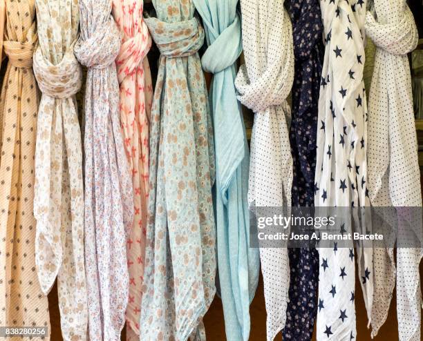 full frame shot of colorful scarves hanging at market for sale in outdoor. street market in begur, catalonia, spain - head scarf stock pictures, royalty-free photos & images